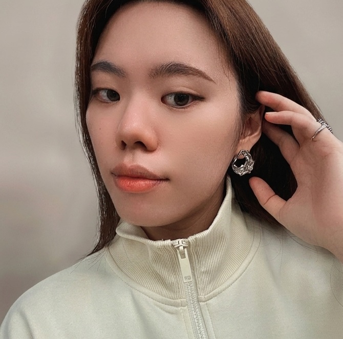 Model wearing the earring